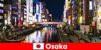 Districte de divertisment și delicatese așteaptă călătorii străini în Osaka Japonia